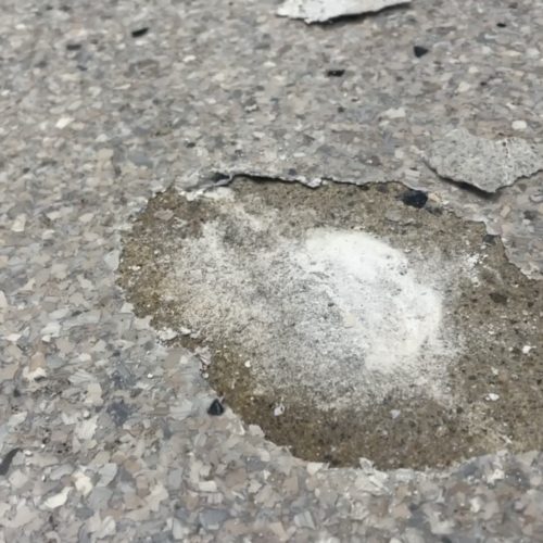 alt="efflorescence under polyaspartic floor when not protected"