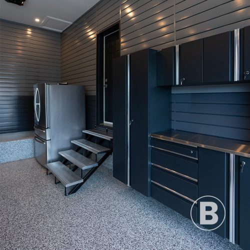 Garage 1 alt="beautiful resurfaced garage with polyaspartic and storage solutions"